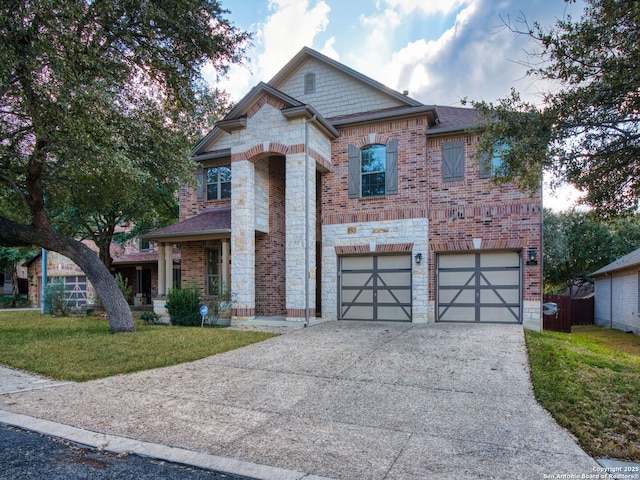 view of front of house featuring a garage and a front lawn