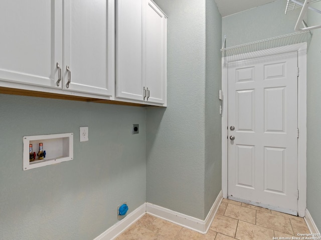 washroom featuring cabinets, electric dryer hookup, and hookup for a washing machine