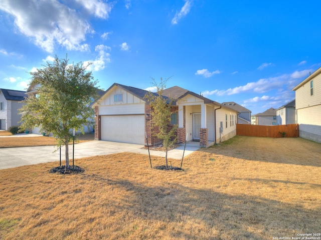 single story home with a garage and a front lawn