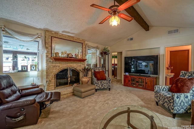 living room with lofted ceiling with beams, carpet, a textured ceiling, and a fireplace