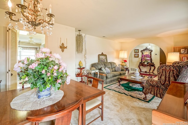 living room with light carpet and ceiling fan