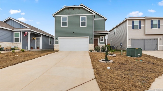 craftsman-style house with cooling unit and a garage