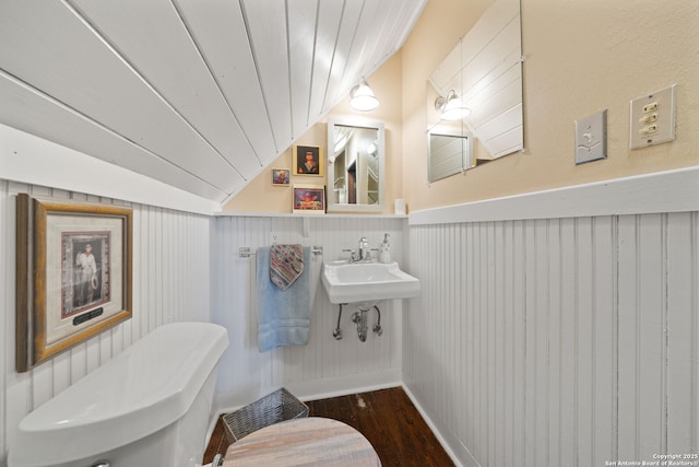 bathroom with sink, lofted ceiling, wooden ceiling, and wood-type flooring