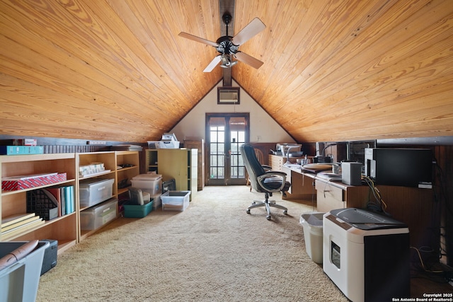 carpeted office space featuring vaulted ceiling, ceiling fan, wooden ceiling, and french doors