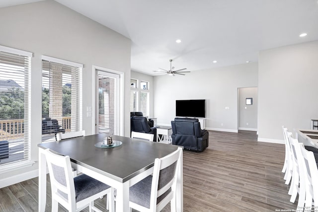 dining space featuring dark hardwood / wood-style floors and ceiling fan