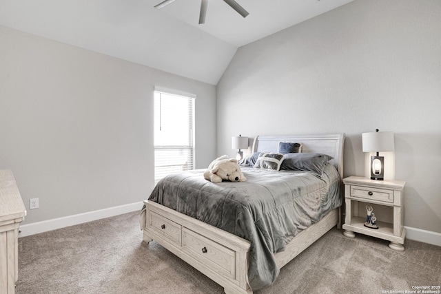 carpeted bedroom featuring vaulted ceiling and ceiling fan