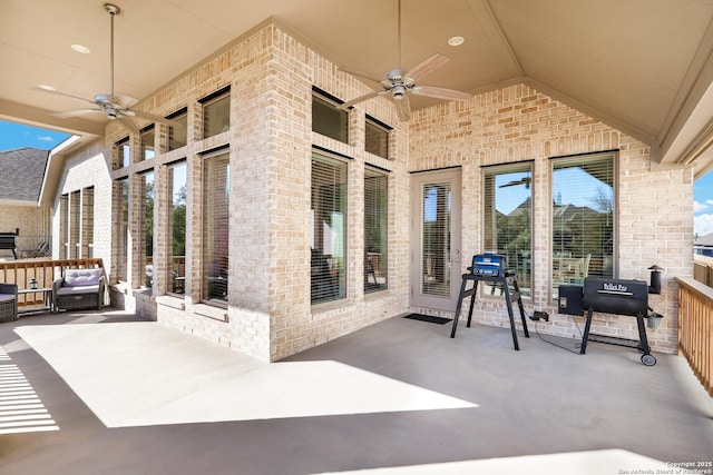 view of patio featuring ceiling fan