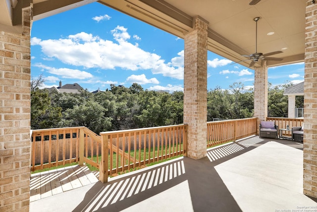 view of patio / terrace featuring ceiling fan