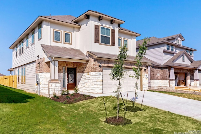 view of front of home featuring a garage and a front yard