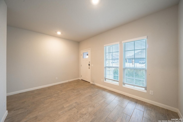 interior space with hardwood / wood-style flooring