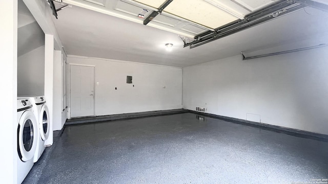 garage featuring washer and dryer