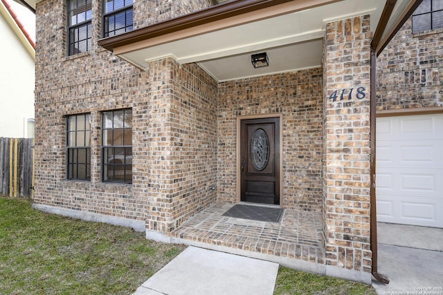 property entrance with a garage