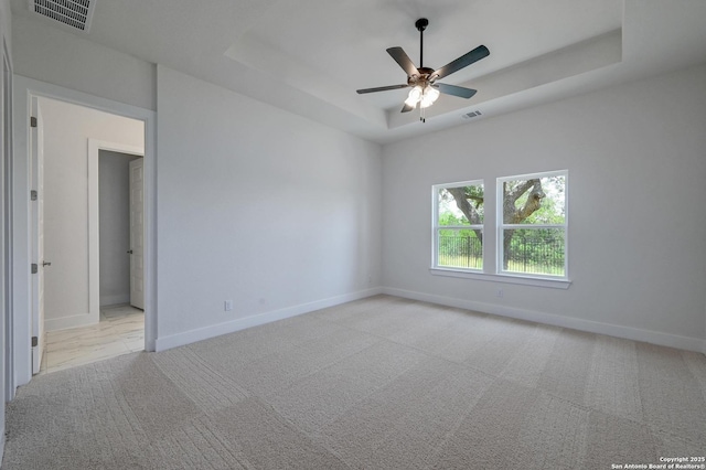 1218 Catnip, New Braunfels, TX 78132 - carpeted empty room with a raised ceiling and a ceiling fan