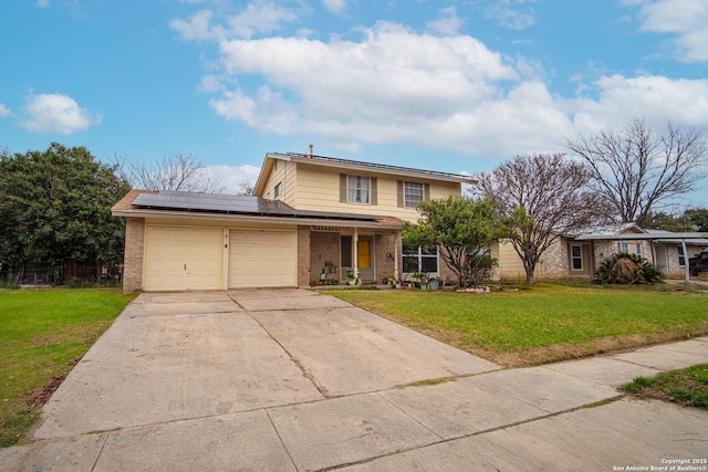 view of front property with a garage, a front yard, solar panels, and covered porch