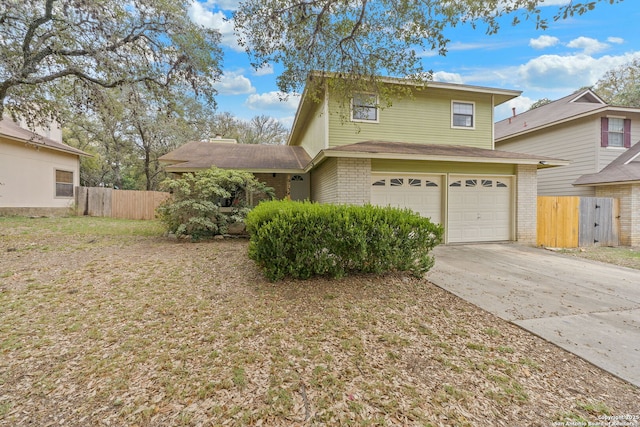 front of property with a garage