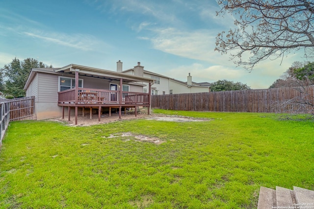 view of yard featuring a wooden deck