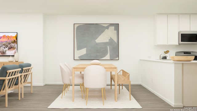 dining space featuring dark wood-type flooring