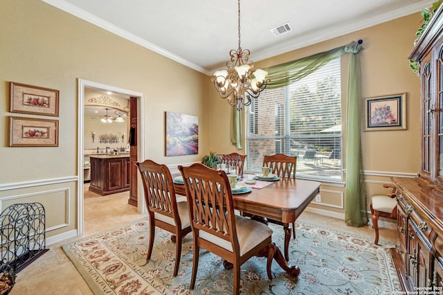 9014 Woodland Pass, Boerne, TX 78006 - dining area with an inviting chandelier, crown molding, visible vents, and a wealth of natural light