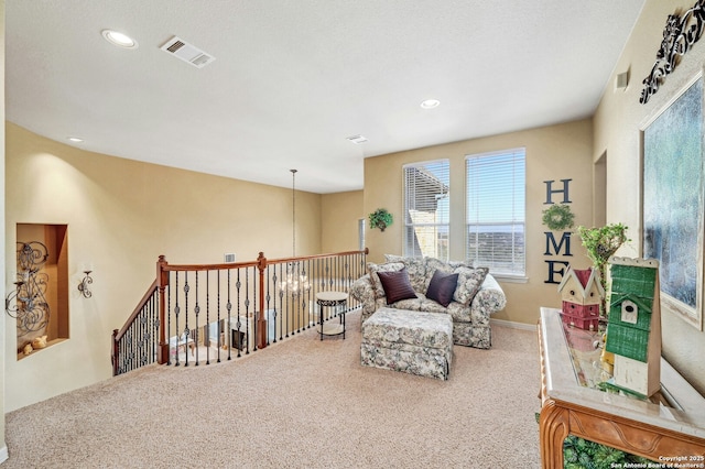 9014 Woodland Pass, Boerne, TX 78006 - sitting room with recessed lighting, visible vents, carpet, and an upstairs landing