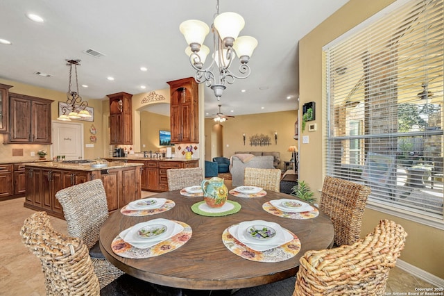 9014 Woodland Pass, Boerne, TX 78006 - dining room featuring visible vents, recessed lighting, and ceiling fan with notable chandelier