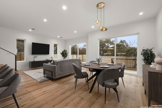 dining room with light hardwood / wood-style flooring