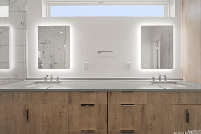 bathroom featuring vanity and a shower