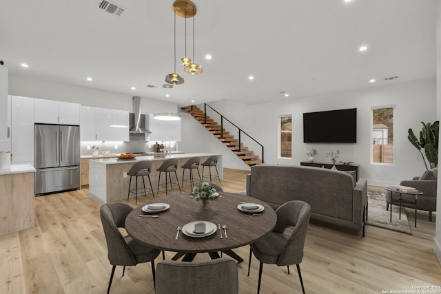 dining room featuring light wood-type flooring