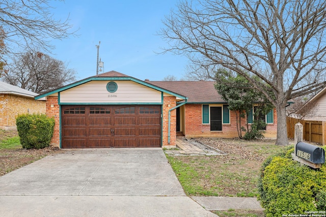 single story home featuring a garage