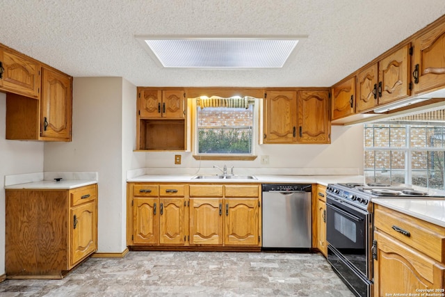 kitchen featuring sink, stainless steel dishwasher, black range with gas stovetop, and a textured ceiling