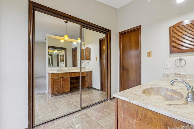 bathroom featuring vanity and tile patterned flooring