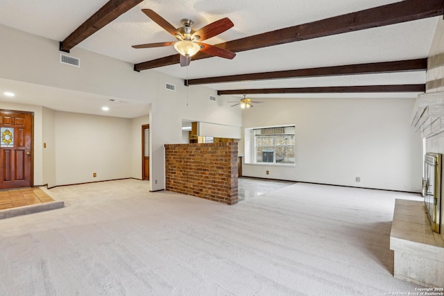 unfurnished living room featuring vaulted ceiling with beams, a textured ceiling, light carpet, a brick fireplace, and ceiling fan