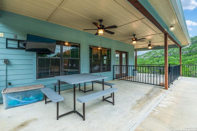 view of patio / terrace featuring ceiling fan