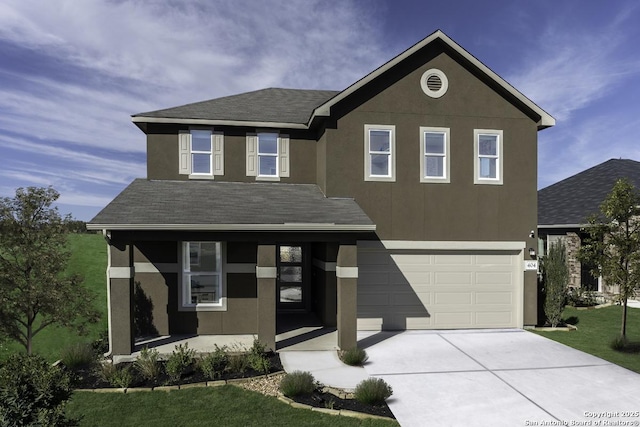 view of front of property with a garage