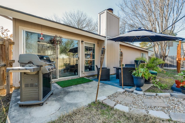 back of house with a patio