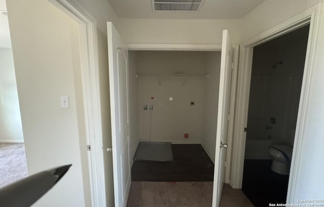 clothes washing area featuring carpet floors, hookup for a washing machine, and electric dryer hookup