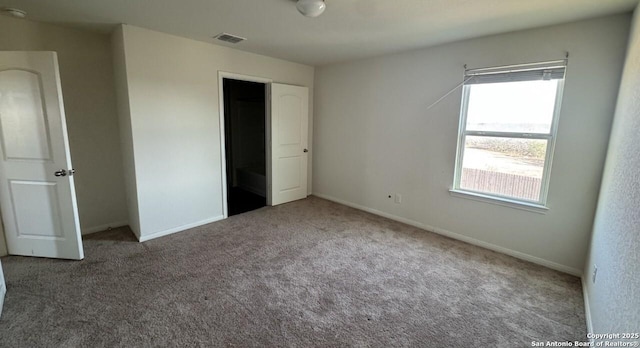 unfurnished bedroom featuring carpet floors