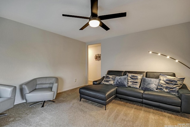 carpeted living room featuring ceiling fan