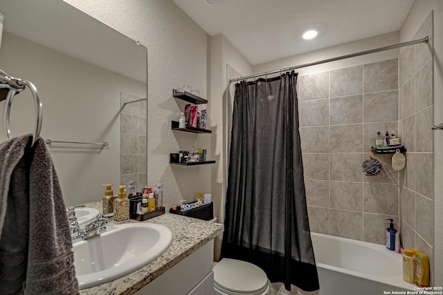 full bathroom featuring vanity, toilet, and shower / bath combo