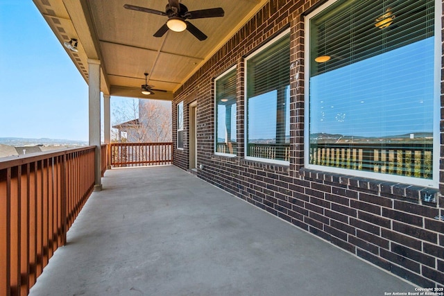 view of patio / terrace featuring ceiling fan