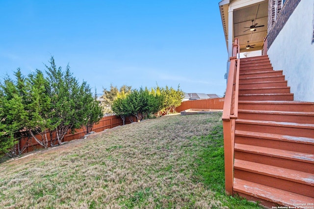 view of yard featuring ceiling fan