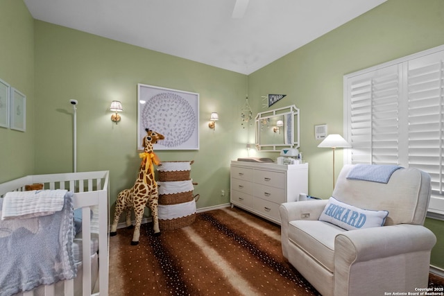 bedroom featuring dark colored carpet