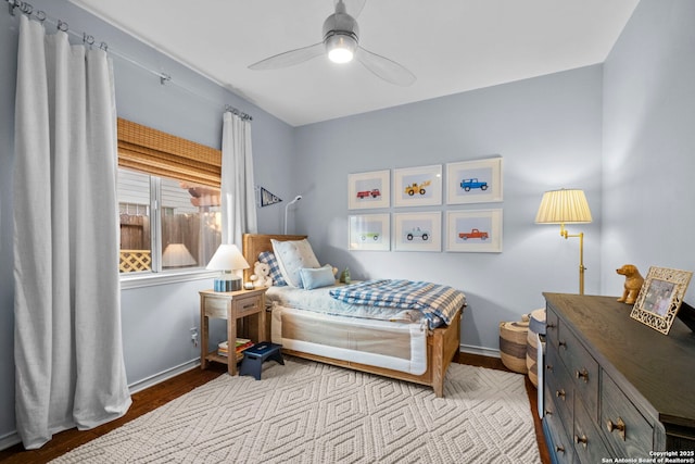 bedroom featuring light hardwood / wood-style flooring and ceiling fan