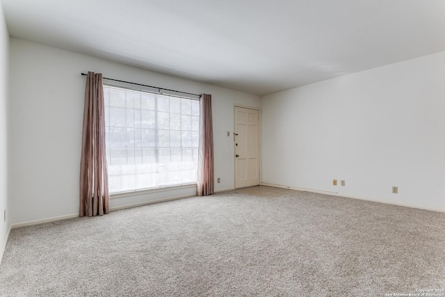 empty room with carpet flooring