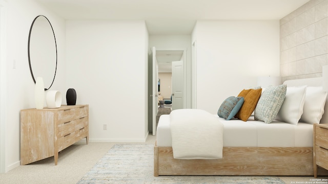 bedroom with light colored carpet