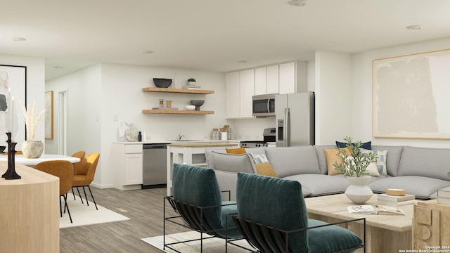 interior space featuring sink and light hardwood / wood-style flooring