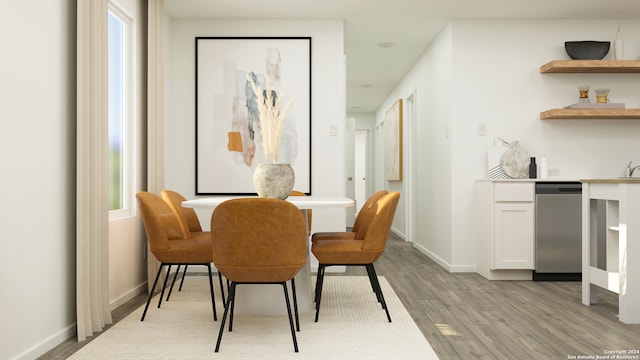 dining space featuring light hardwood / wood-style flooring