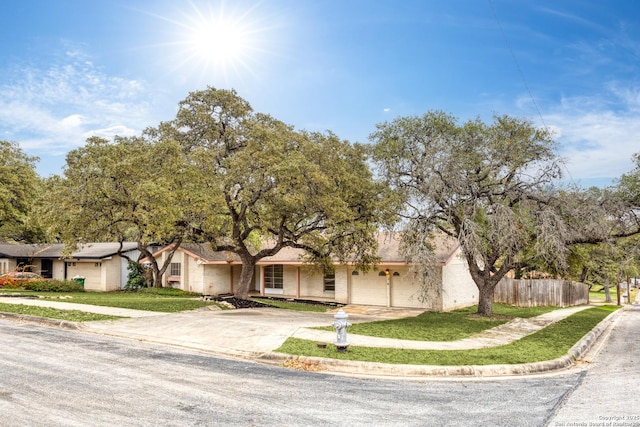 view of front of property with a front lawn