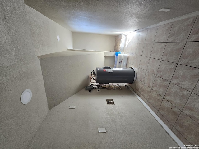 interior space featuring a textured ceiling