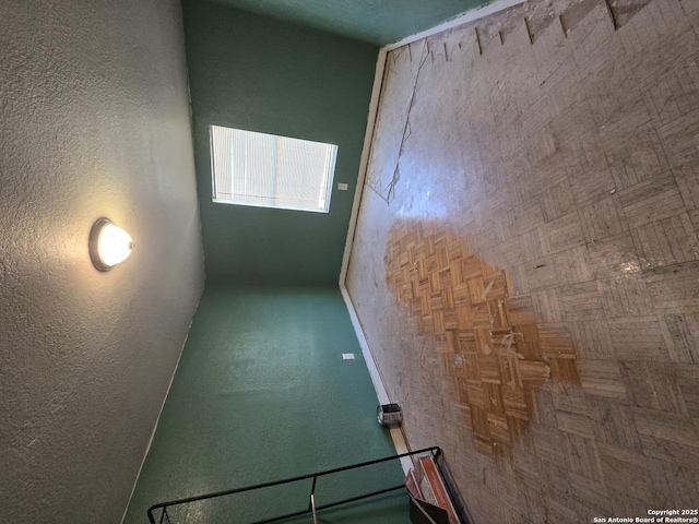 spare room featuring parquet floors