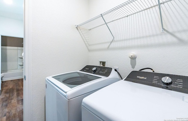 11707 Anselmo, San Antonio, TX 78254 - laundry room with dark wood-type flooring and washer and clothes dryer
